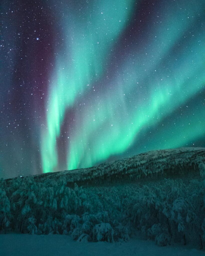 Aurora Borealis with sky full of stars